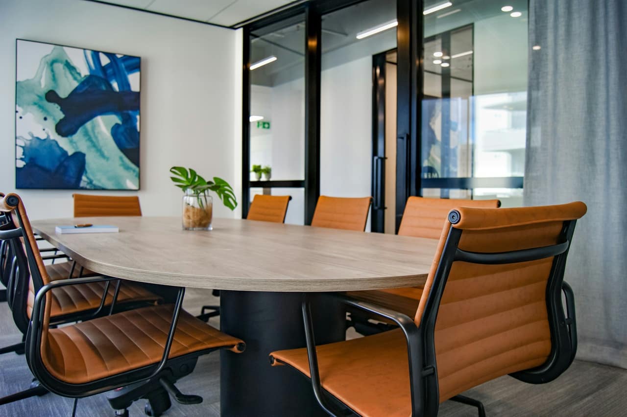 Meeting room with a table and chairs